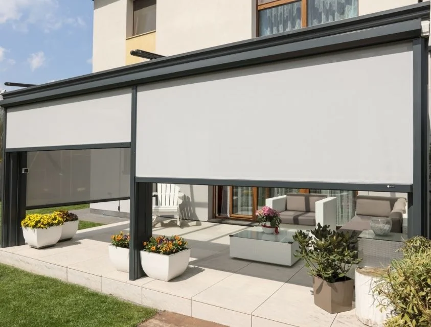 Retractable awning shading a villa terrace